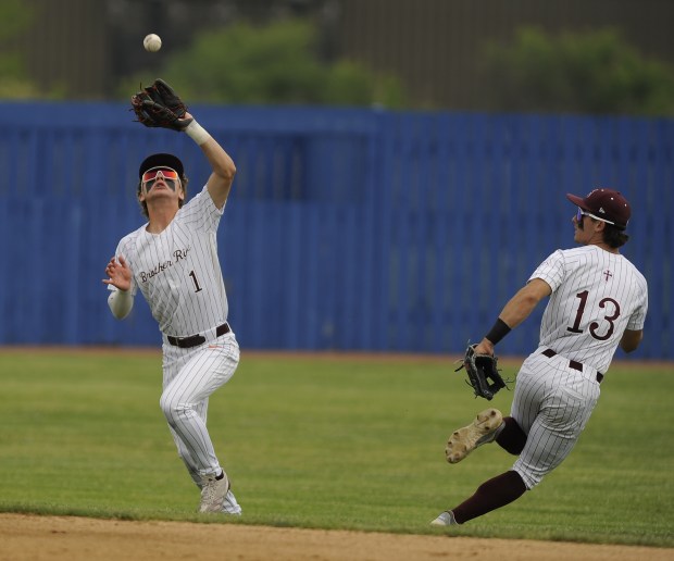 Brother Rice's shortstop Colin Campbell (1) catches a pop up for an out against Mount Carmel during the Class 4A Reavis Sectional final Saturday, June 7, 2025 in Burbank, IL. (Steve Johnston/for the Daily Southtown)
