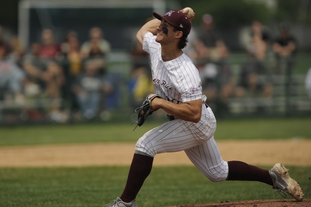 Brother Rice's relief pitcher Jackson Natanek (13) delivers a pitch against Mount Carmel at the Class 4A Reavis Sectional final Saturday, June 7, 2025 in Burbank, IL. (Steve Johnston/for the Daily Southtown)