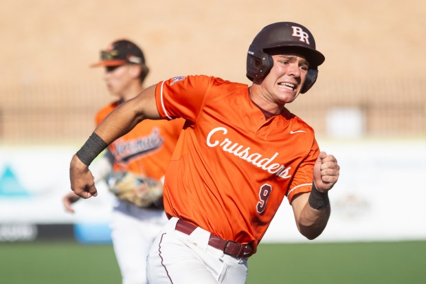 Brother Rice's Aidan Nohava (9) rounds third base against Normal during the Class 4A third place game in Joliet on Saturday, June 14, 2025. (Troy Stolt for the Daily Southtown)
