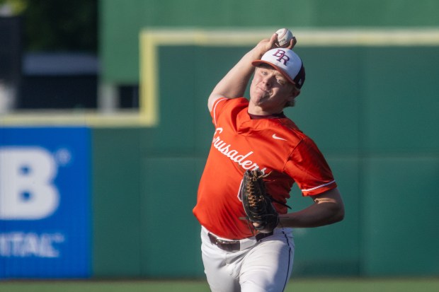 Brother Rice's JD Maloney (6) throws a pitch against Normal during the Class 4A third place game in Joliet on Saturday, June 14, 2025. (Troy Stolt for the Daily Southtown)