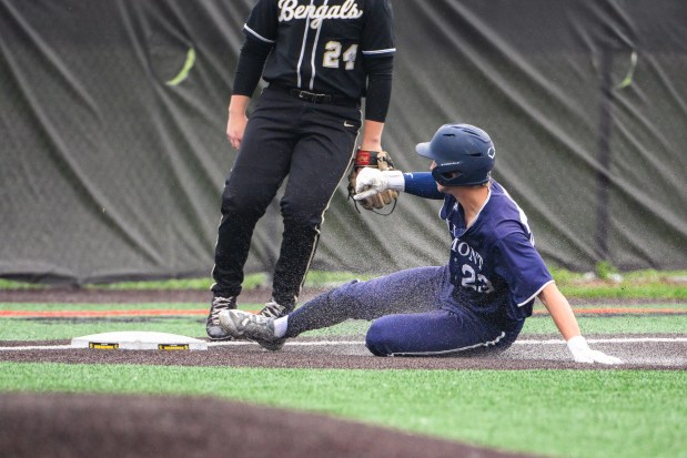Lemont senior Shea Glotzbach (23) slides into third during the Lemont vs. Oak Forest Class 3A St. Laurence Sectional baseball semifinal in Burbank, IL on Thursday, June 5, 2025. (Andrew Burke-Stevenson/for the Daily Southtown)