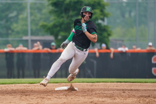 Providence's Cooper Eggert (3) rounds second base off of a three-run triple against Lincoln-Way East during a Lincoln-Way West Class 4A Sectional final game at Lincoln-Way West High School in New Lenox on Saturday, June 7, 2025. (Sean King / for The Daily Southtown)