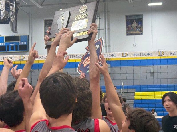 Marist players celebrate after defeating Mount Carmel in the De La Salle Sectional final in Chicago on Tuesday, June 3, 2025. (Jeff Vorva / Daily Southtown)