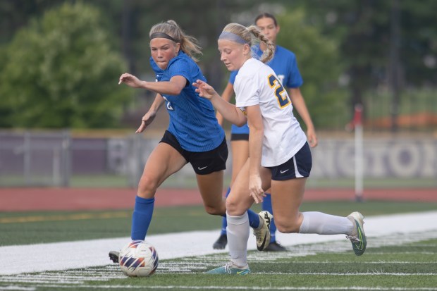 Lincoln-Way East's Kara Waishwell (2) dribbles downfield against O'Fallon during the Class 3A Bloomington Supersectional game In Bloomington on Tuesday, June 3, 2025. (Troy Stolt for the Daily Southtown)