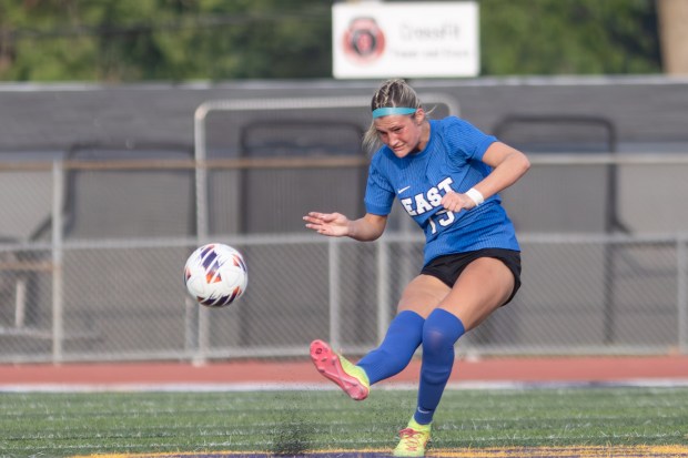 Lincoln-Way East's Camden Cosich (13) takes a free kick against O'Fallon during the Class 3A Bloomington Supersectional game In Bloomington on Tuesday, June 3, 2025. (Troy Stolt for the Daily Southtown)