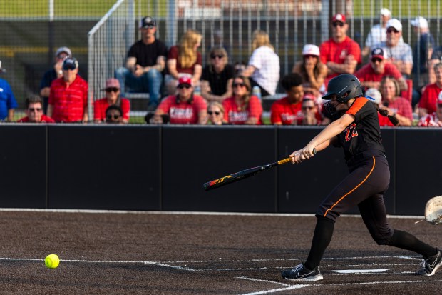 Beecher's Taylor Norkus (22) connects on a pitch from Brimfield/Elmwood during the Class 2A East Peoria Supersectional at EastSide Centre in East Peoria on Monday, June 2, 2025. (Vincent D. Johnson / for the Daily Southtown)
