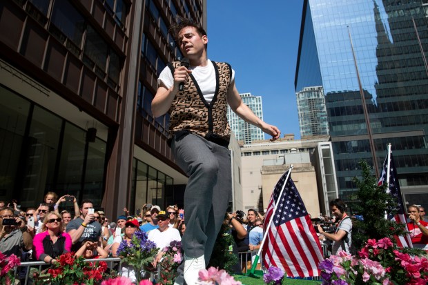 Ryan Stajmiger performs "Twist and Shout" as Ferris Bueller in a reenactment of the parade scene from the movie "Ferris Bueller's Day Off," which was 30 years old on May 22, 2016. The performance was part of three-day "Ferris Fest" organized by a small group of Ferris Bueller and director John Hughes fans. (Erin Hooley/Chicago Tribune)
