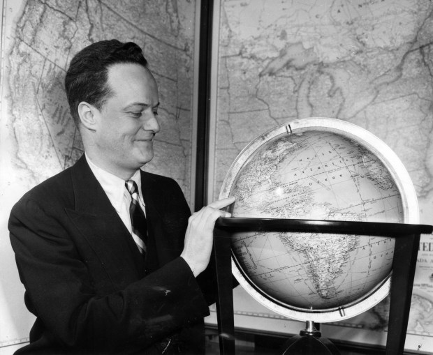 Andrew McNally III, president of Rand McNally, is photographed on opening day in the new Rand McNally map store, where motorists can secure the latest road and travel information in 1952. (Rand McNally & Co.)