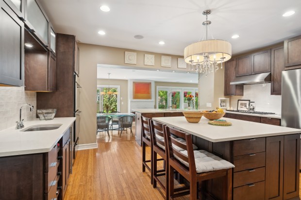 This four-bedroom home at 505 Jackson Ave. in Glencoe has a bedroom with a play space and a painted ceiling. (Brad Schade)
