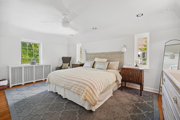 This four-bedroom home at 505 Jackson Ave. in Glencoe has a bedroom with a play space and a painted ceiling. (Brad Schade)