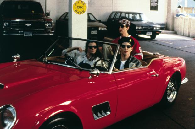 Matthew Broderick stars as a delightfully charming high-school senior who, with his girlfriend Sloane (Mia Sara) and best friend Cameron (Alan Ruck), ditches school to enjoy one perfect day as a kid with no responsibilities in Ferris Bueller's Day Off, originally released on June 11, 1986. (Paramount Pictures/AP)