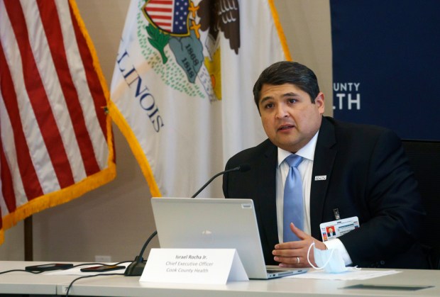 Cook County Health's then CEO Israel Rocha Jr. responds to questions from reporters during a meeting with Cook County officials to discuss COVID-19 vaccine distribution plan for suburban Cook County on Dec. 14, 2020. (Youngrae Kim/Chicago Tribune)