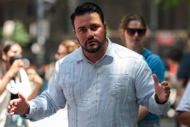 State Sen. Omar Aquino speaks during a migrant health care protest on June 21, 2023, at Federal Plaza in Chicago. (Shanna Madison/Chicago Tribune)