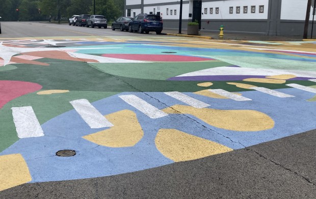 The entire intersection of Lake and Genesee streets is now a mural. (Steve Sadin/For the Lake County News-Sun)